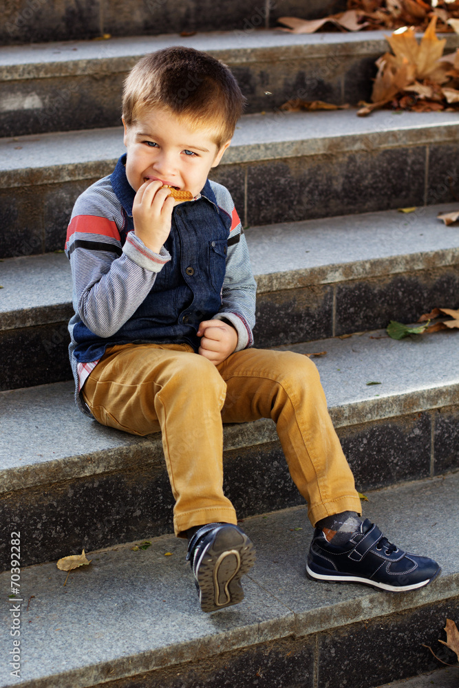 Little toddler boy in autumn park Little toddler boy in autumn park