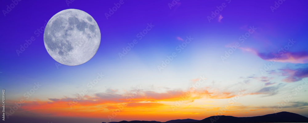 purple and orange sunset with moon