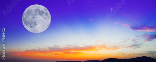 purple and orange sunset with moon