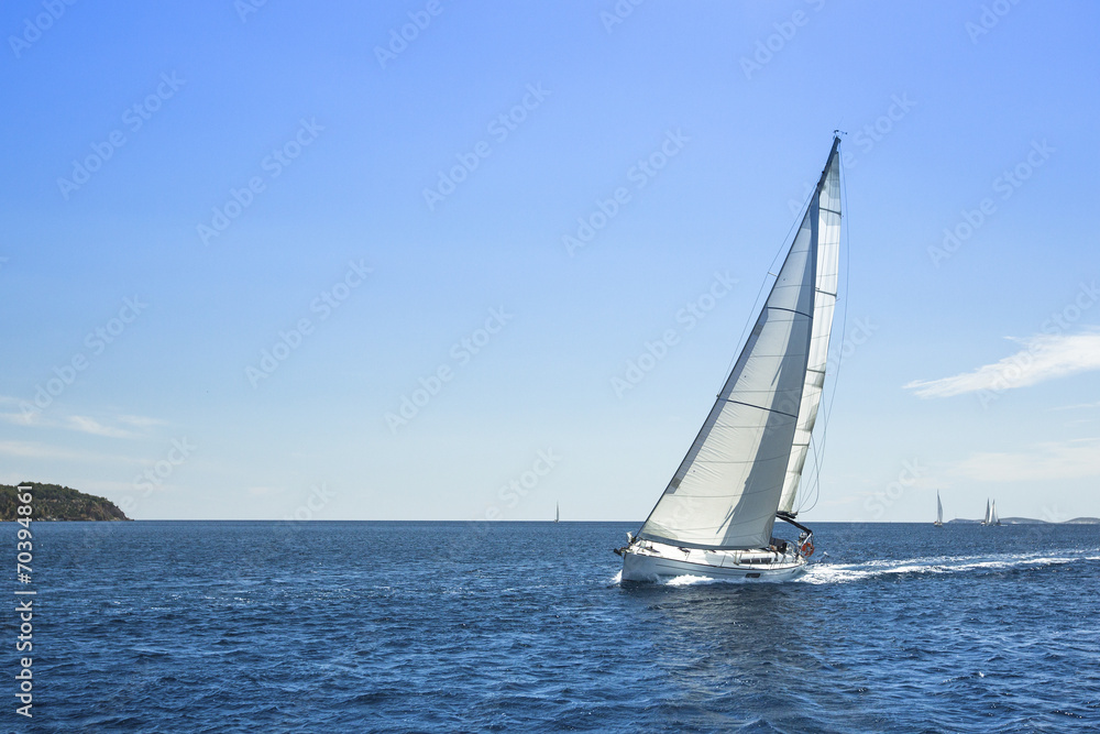 Sailing on a calm sea.