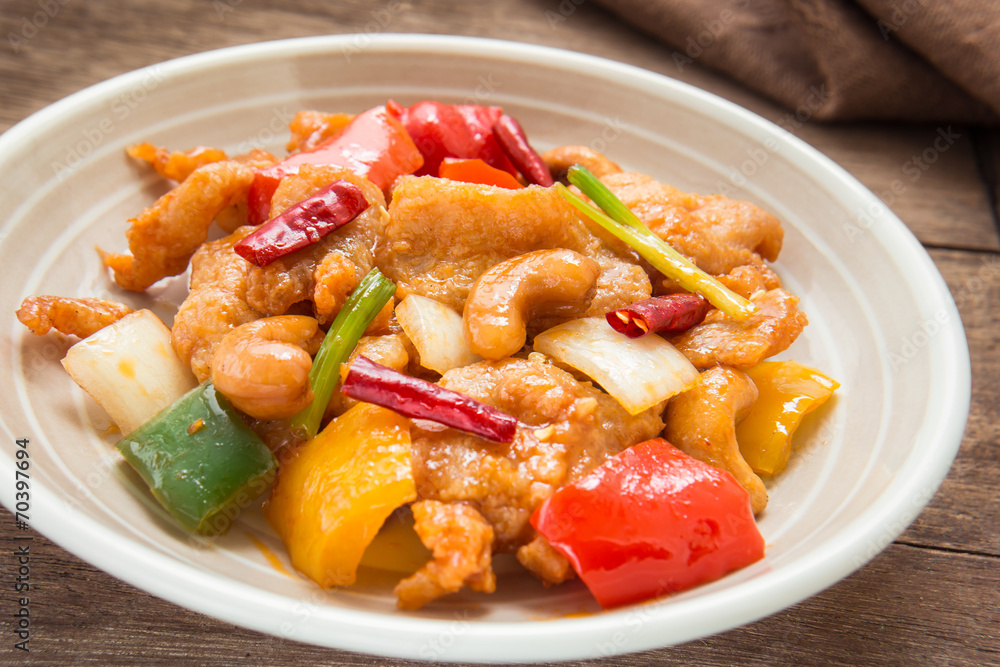 Stir fired chicken with cashew nuts on plate Stir fired chicken with cashew nuts on plate