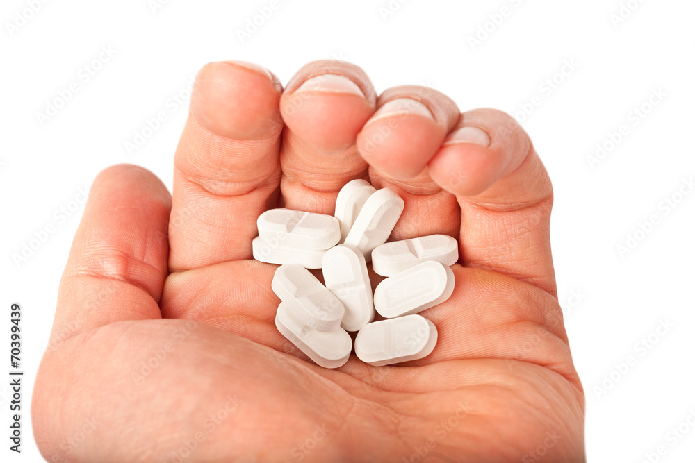 pills in the hand pills in the hand