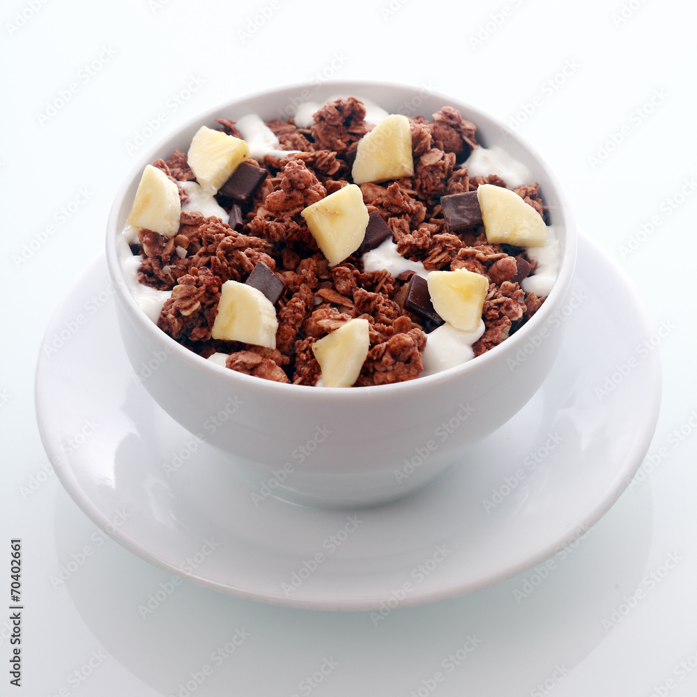 Chocolate breakfast cereal with diced fresh banana Chocolate breakfast cereal with diced fresh banana
