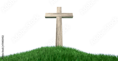 Crucifix On A Grassy Hill Isolated