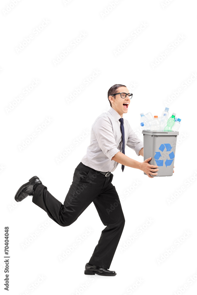Man running with a recycle bin in his hands Man running with a recycle bin in his hands
