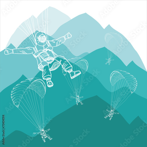 paragliding sportsmen in winter mountains