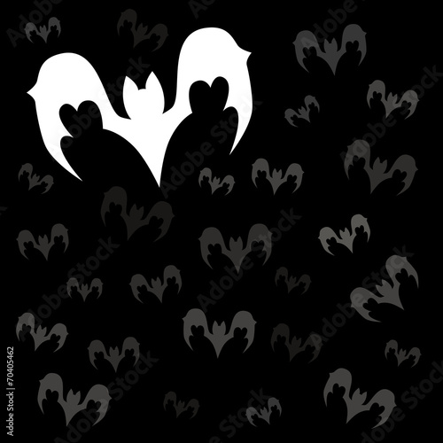 White bat on black background