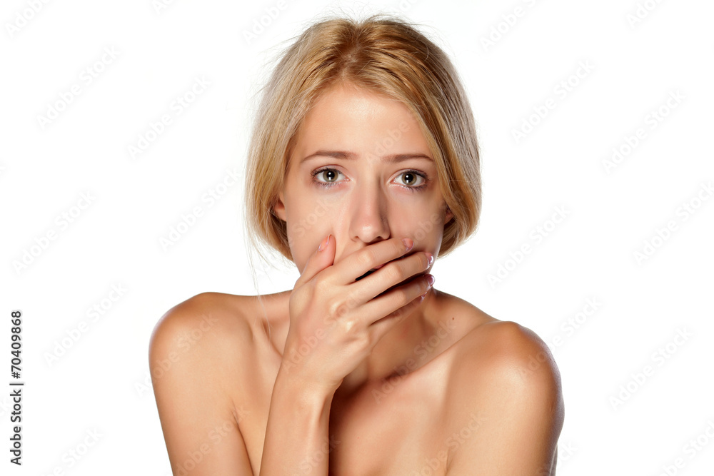 stunned and shameful young blonde on white background stunned and shameful young blonde on white background
