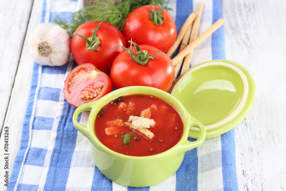 Tasty tomato soup with croutons on table close-up Tasty tomato soup with croutons on table close-up