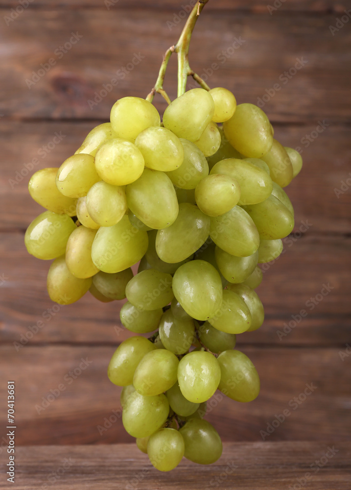 Bunch of grape on wooden background Bunch of grape on wooden background