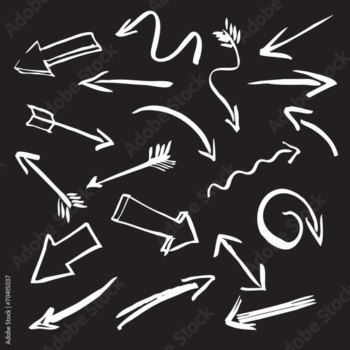 white vector arrows and black background