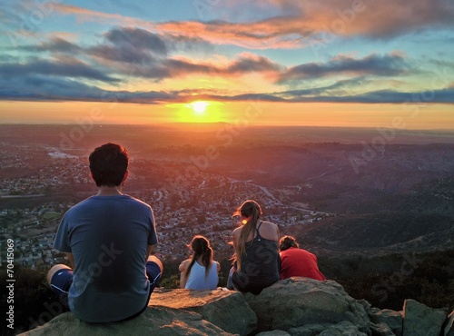 People Watching a Colorful Sunset over San Diego, California