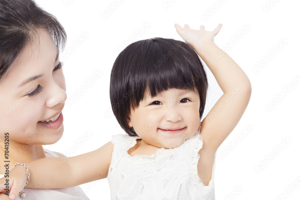 Happy mother holding smiling child baby Happy mother holding smiling child baby