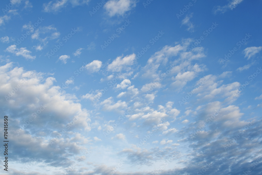 White soft clouds in blue sky