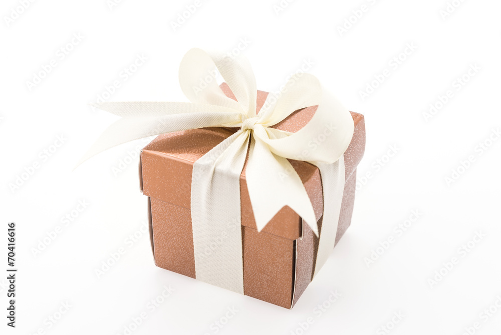 Gold gift box isolated on white background Gold gift box isolated on white background