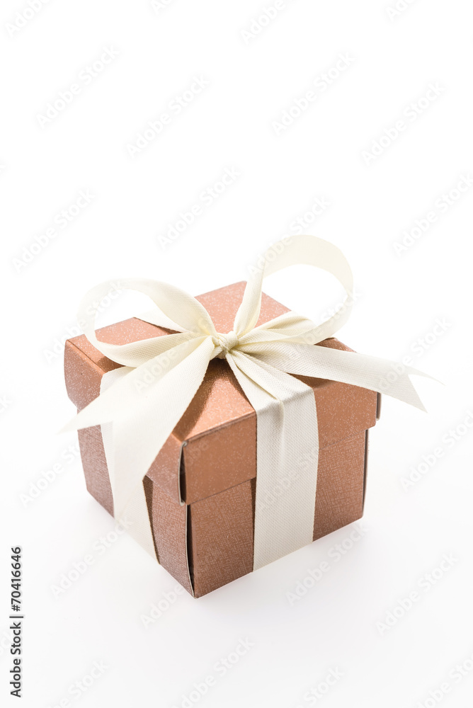 Gold gift box isolated on white background Gold gift box isolated on white background