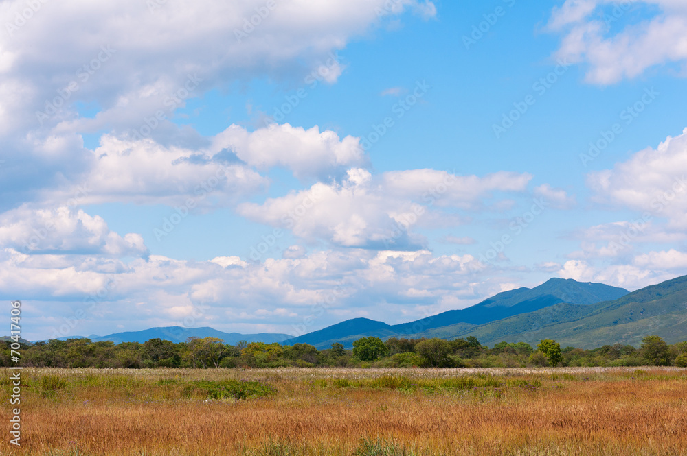 Landscape with mountain views, blue sky and beautiful clouds. Landscape with mountain views, blue sky and beautiful clouds.