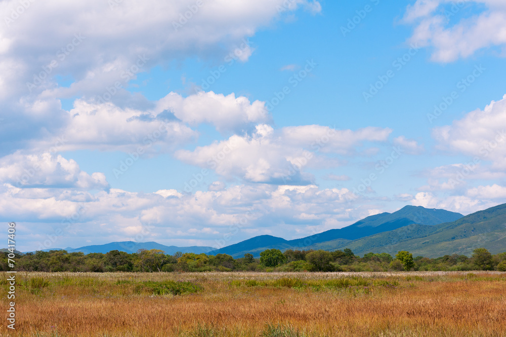 Landscape with mountain views, blue sky and beautiful clouds.