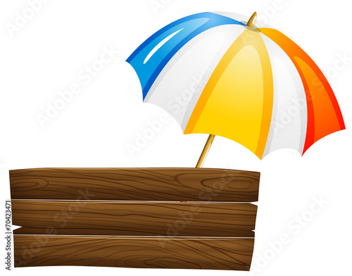 An empty signboard and an umbrella