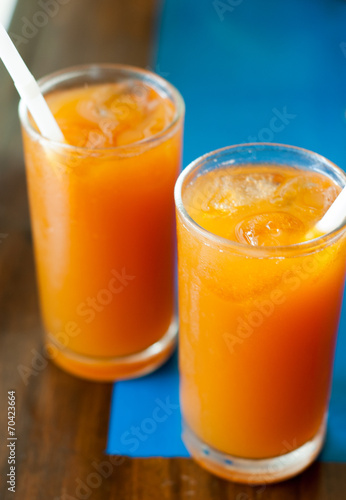 orange lemonade with ice cubes