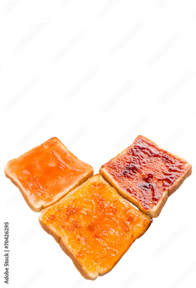 Mix fruit, blueberry, orange fruit jam spread on bread toast Mix fruit, blueberry, orange fruit jam spread on bread toast