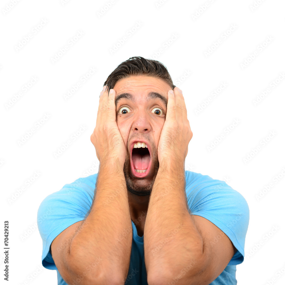 Portrait of angry man screaming and pulling hair against white b Portrait of angry man screaming and pulling hair against white b