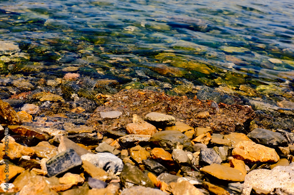 Shallow water with stones inside