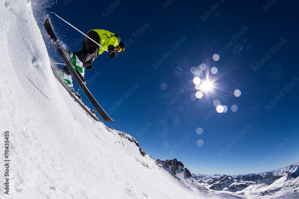 Alpine skier on piste, skiing downhill - obrazy, fototapety, plakaty 