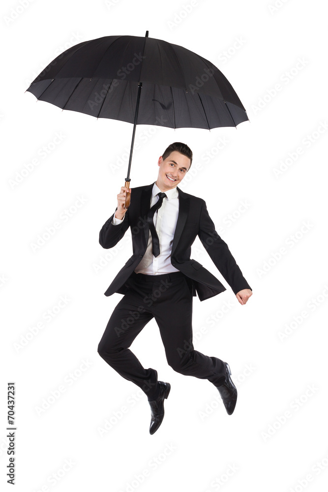 Jumping businessman with an umbrella Jumping businessman with an umbrella