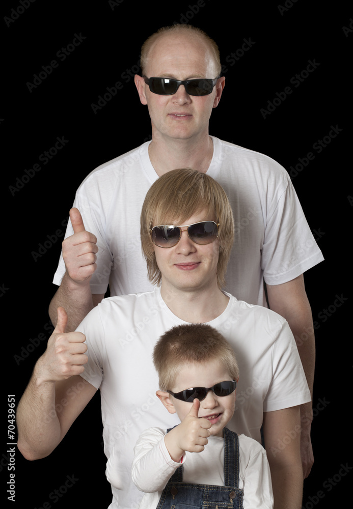 Father and sons giving thumbs up sign