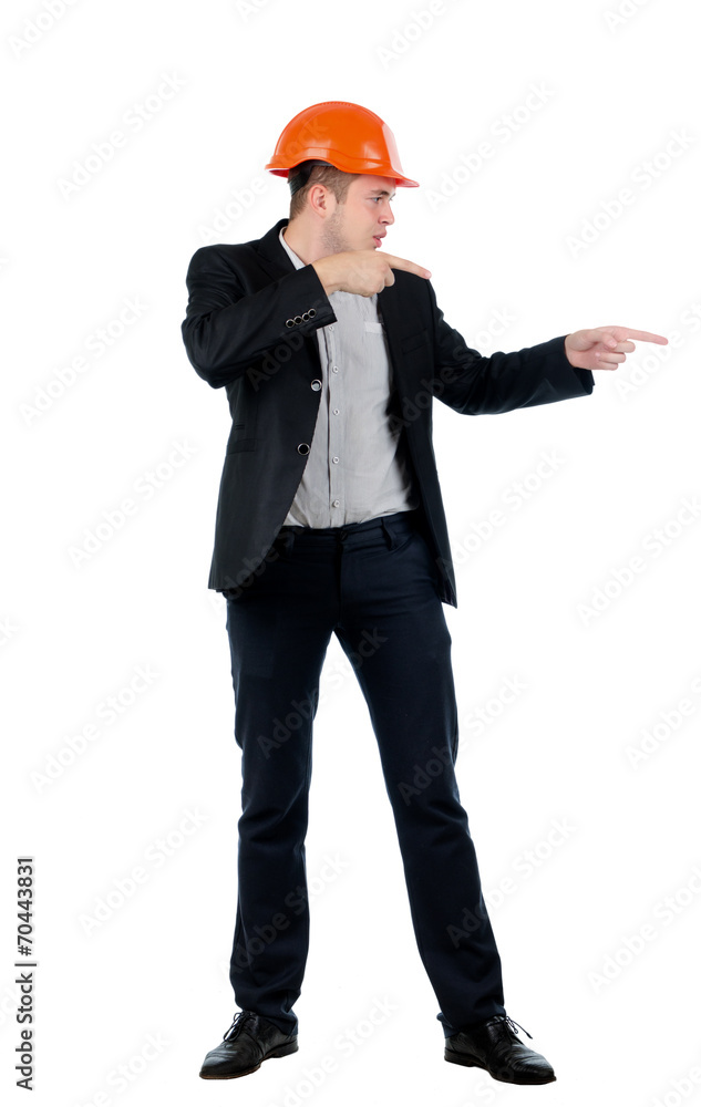 Young builder, architect or engineer pointing Young builder, architect or engineer pointing