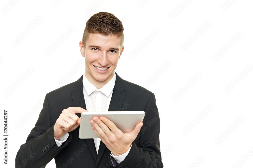Young businessman holds tablet pc, right you can write some text Young businessman holds tablet pc, right you can write some text