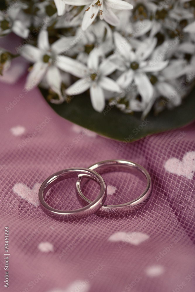 Beautiful wedding rings on purple background Beautiful wedding rings on purple background
