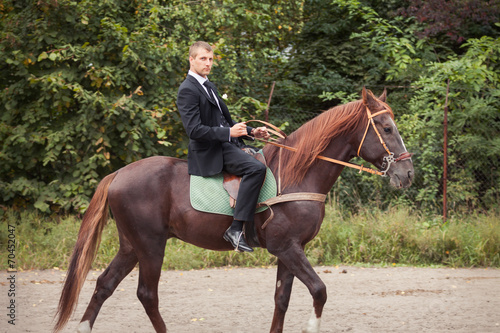 groom on horse