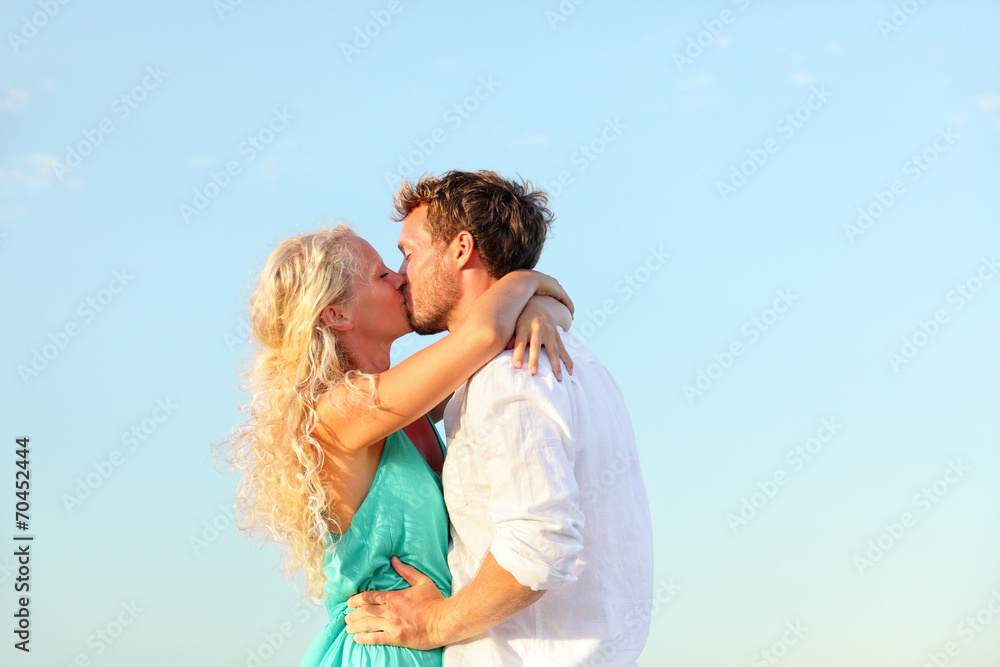 Romantic kissing couple in love Romantic kissing couple in love