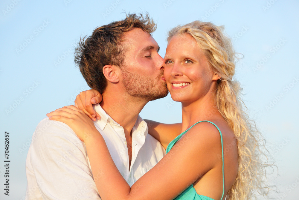 Kissing romantic couple in love smiling happy Kissing romantic couple in love smiling happy