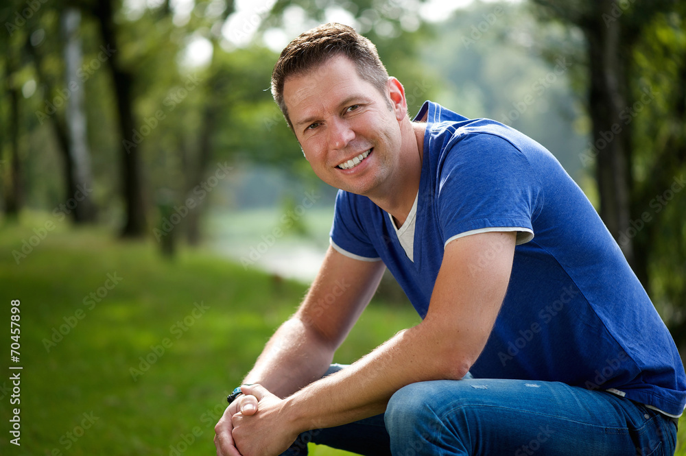 Mature man smiling outdoors Mature man smiling outdoors