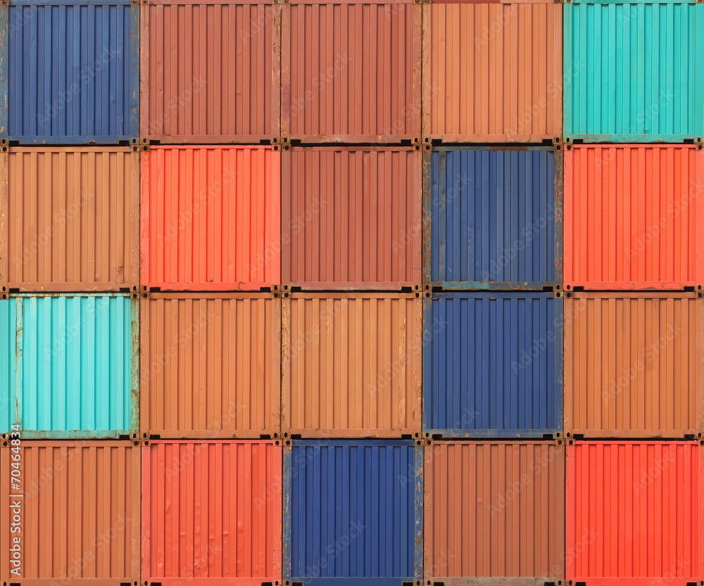 Stack of colorful freight shipping containers at the docks Stack of colorful freight shipping containers at the docks