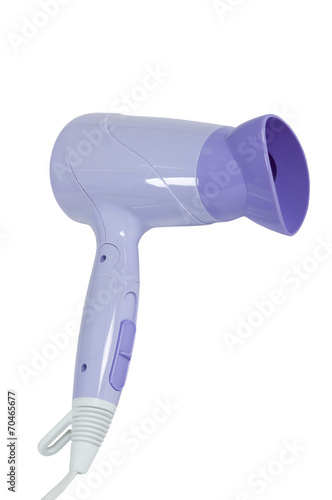 Hair dryer on purple background