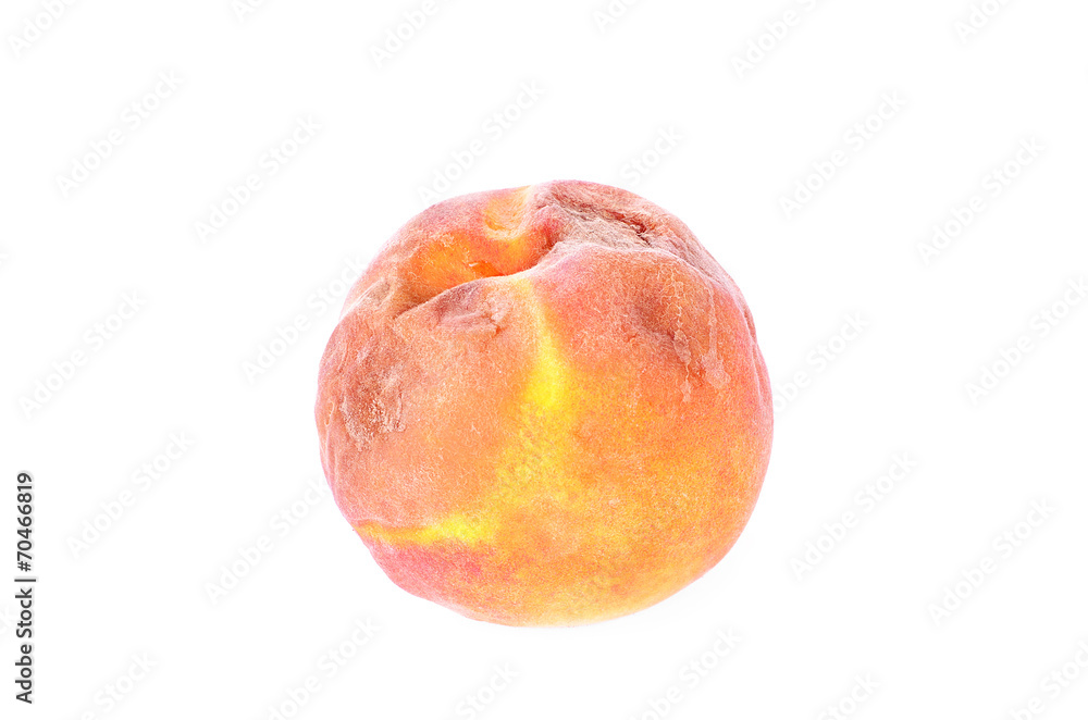Fototapeta premium Rotten peach isolated on a white
