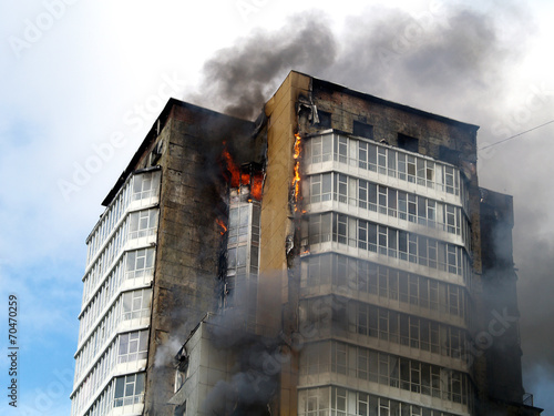 Bild auf Leinwand skyscraper on fire