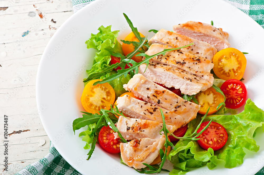 Grilled chicken breasts and fresh salad Grilled chicken breasts and fresh salad