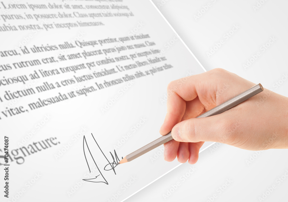 Hand writing personal signature on a paper form Hand writing personal signature on a paper form