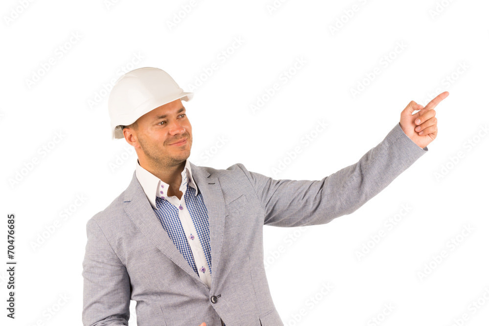 Smiling Engineer on White Helmet Pointing Side Smiling Engineer on White Helmet Pointing Side