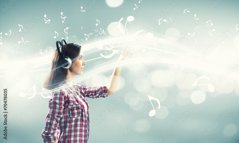 © Sergey Nivens - Girl with headphones