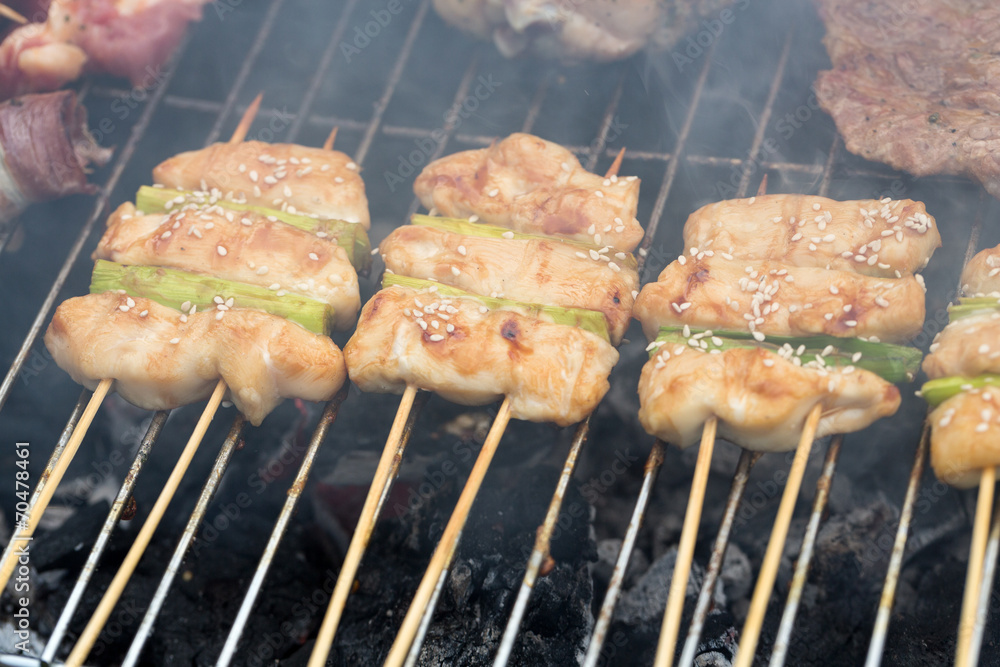 barbecue with delicious grilled meat and leek barbecue with delicious grilled meat and leek
