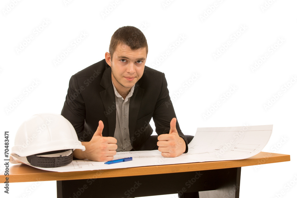 Young architect giving a thumbs up of success Young architect giving a thumbs up of success