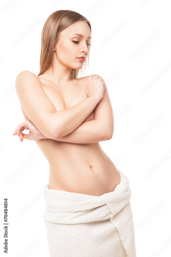 Woman after bath with towel isolated on white Woman after bath with towel isolated on white