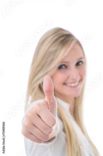 Smiling Woman Giving Thumbs Up to Camera