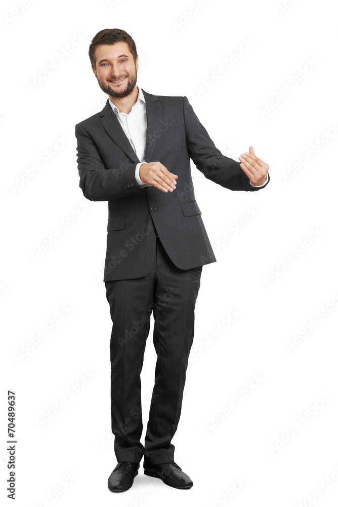 smiley businessman holding something smiley businessman holding something